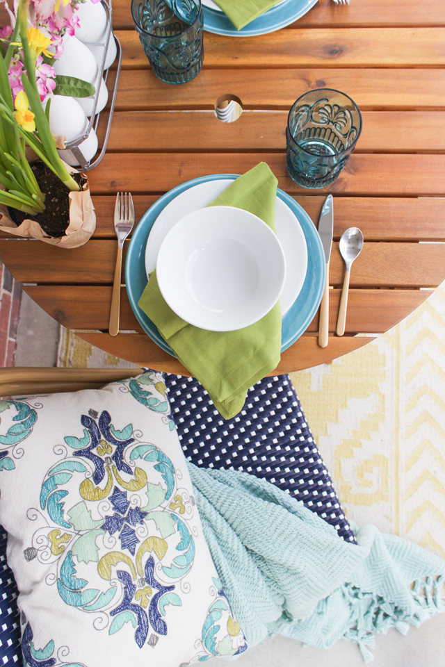 Spring place setting with aqua, teal, navy, green and yellow