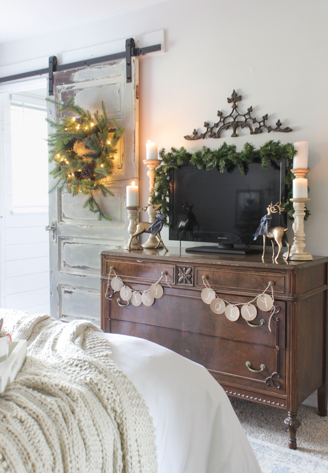 Vintage dresser and barn door with rustic Christmas decor