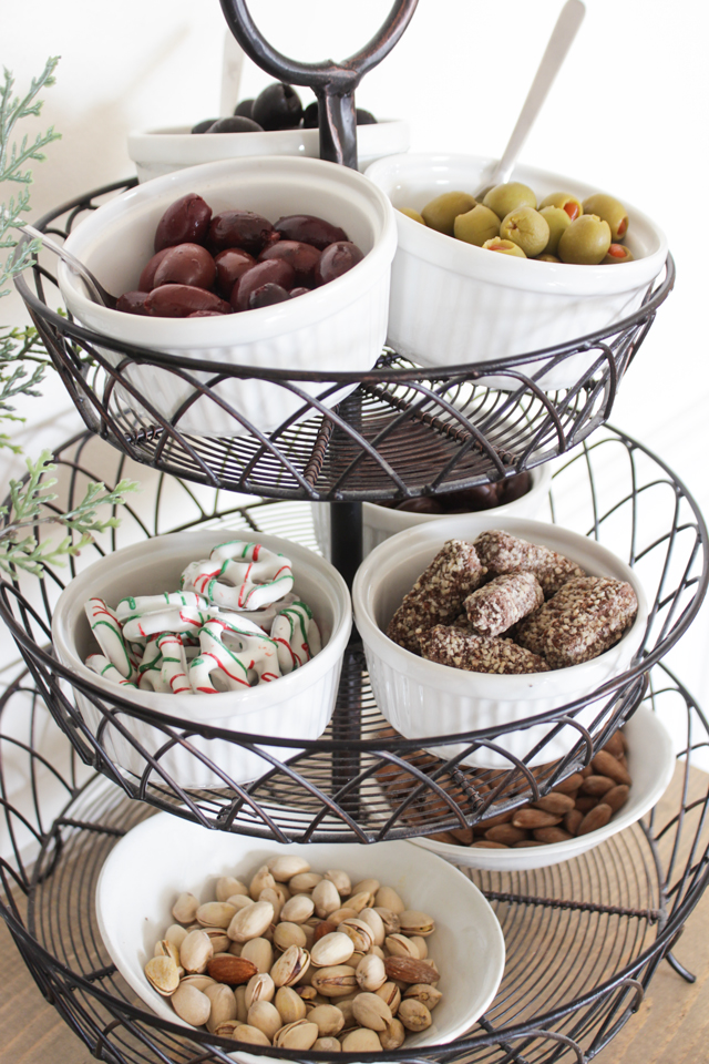 Tiered stand with bowls of snacks