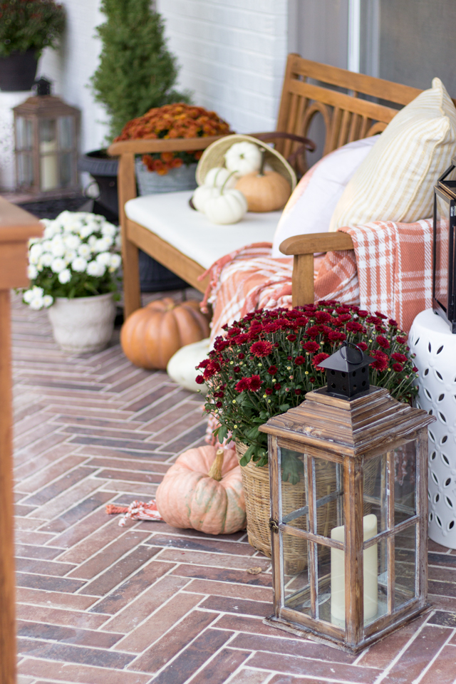 Fall front porch with herringbone brick tile