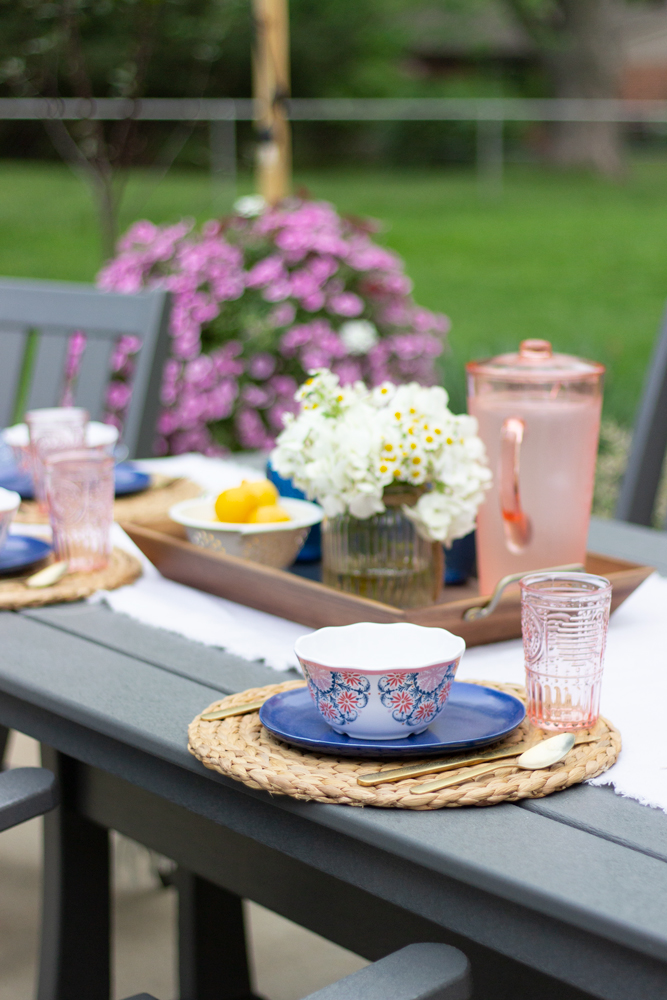 Outdoor place setting with navy and pink 
