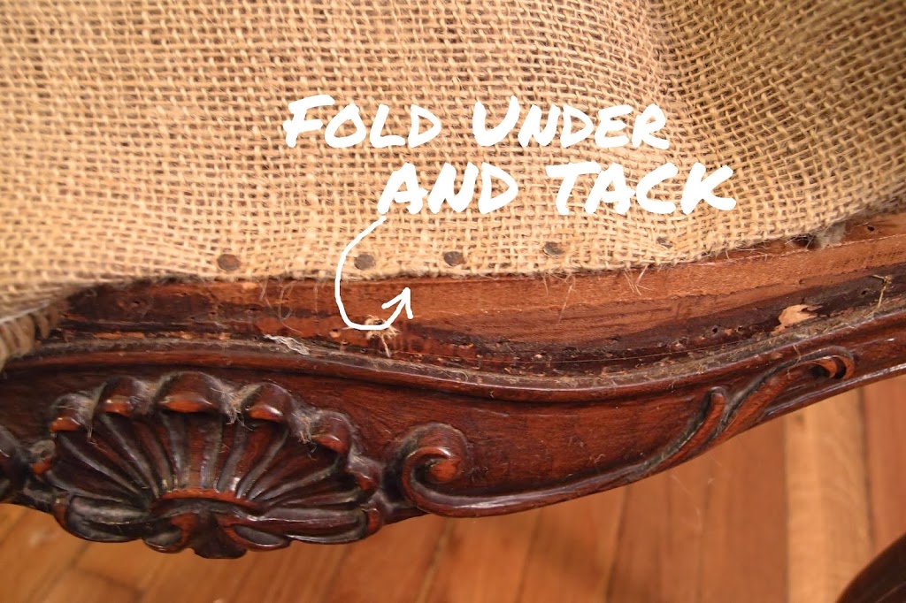 Tacking down burlap with tack nails on french chair