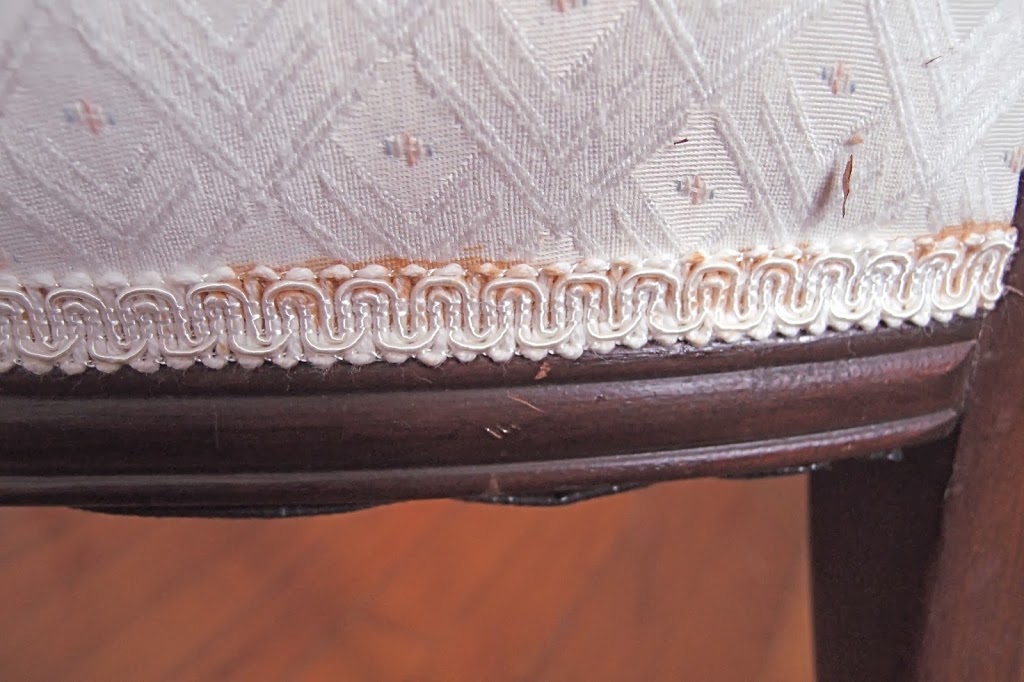 Stained gimp trim on french chair