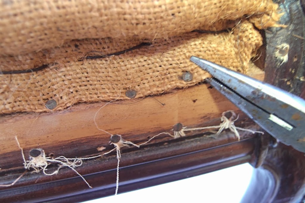 Removing tack nails from burlap on french chair