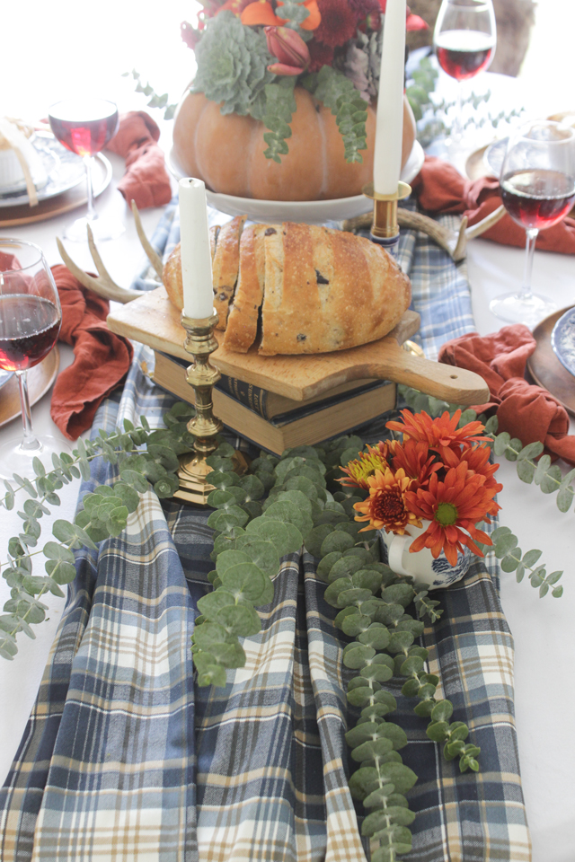 A colorful Thanksgiving Tablescape with individual pies