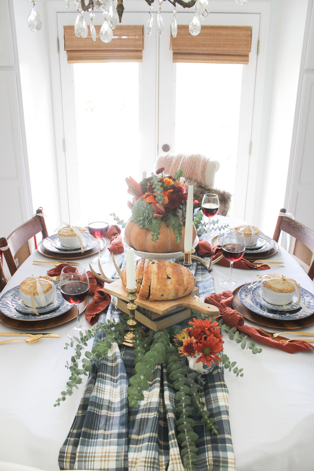 A colorful Thanksgiving Tablescape with individual pies